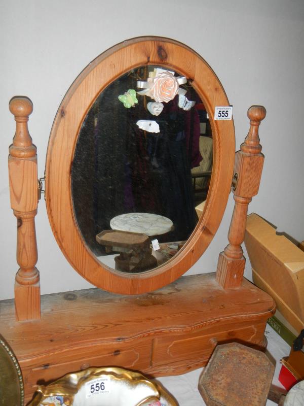 A pine bathroom mirror