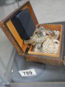 A box of costume jewellery