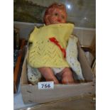 A vintage plastic collectors doll