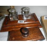 A double ink stand and an ink blotter