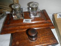 A double ink stand and an ink blotter