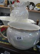 A jug and bowl set and a chamber pot