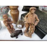 A quantity of wooden and clay figures etc