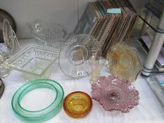 A mixed collection of glass items