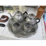 A pewter tea and coffee set on tray