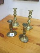 2 pair of brass candlesticks