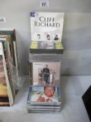 A collection of CDs including Cliff Richard