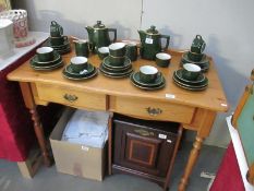 A pine table with two drawers