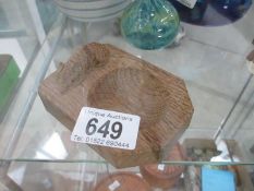 A wooden ash tray