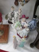 A collection of figurines including Guiseppe Armani