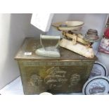 A brass and wooden log box featuring nautical panels,