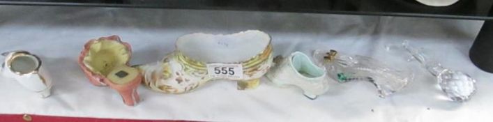 A collection of china and glass shoe ornaments etc