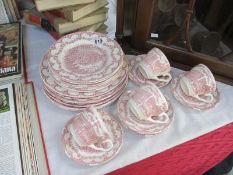 A collection of approximately 22 pieces of English Ironstone pottery including cups, saucers,