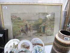 A framed and glazed watercolour of Family Playing in Stream