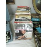 A collection of 45 rpm single records