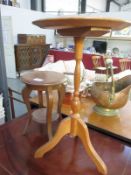 A tripod table and a small plant stand