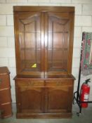 A good solid oak display cabinet with glazed top