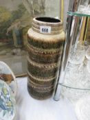 A tall West German pottery vase