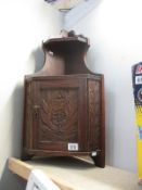 A vintage hanging shelf cupboard