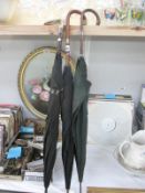 3 vintage black umbrellas