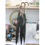 3 vintage black umbrellas