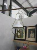 A hanging oil lamp