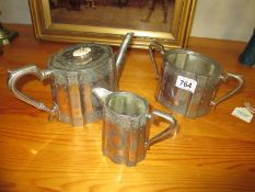 A pewter 3 piece tea set