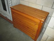 A pine chest of drawers