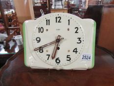 A retro ceramic 8 day wall clock.