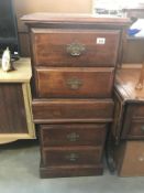 2 dark wood stained bedside chest of drawers