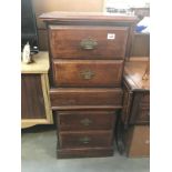 2 dark wood stained bedside chest of drawers