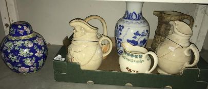 A pair of Victorian jugs and others including vases, ginger jar etc.