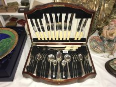 A good cased canteen of cutlery (1 knife missing)