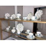 A set of Aynsley tea ware, circa 1930's, with blue butterfly handle,12 cups, 12 saucers, 12 sides,