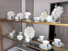 A set of Aynsley tea ware, circa 1930's, with blue butterfly handle,12 cups, 12 saucers, 12 sides,