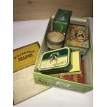 A collection of 8 vintage tins, mainly cigarette including Players, Sweet Rosemary etc.