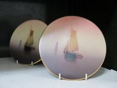 A pair of Bretby nautical scene wall plaques