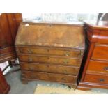 A mahogany bureau.