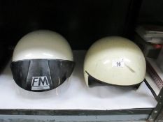 2 vintage motorbike helmets