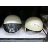 2 vintage motorbike helmets