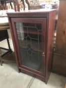 A dark wood stained music cabinet with glazed door ****Condition report**** Age is