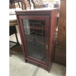 A dark wood stained music cabinet with glazed door ****Condition report**** Age is