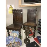 A pair of 19th century Gothic style hall chairs