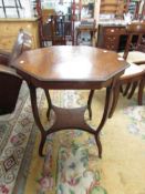 A mahogany inlaid octagonal occasional table.