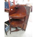 A Georgian mahogany corner wash stand.