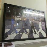 A framed and glazed Beatles Abbey Road print, 90 x 60 cm.