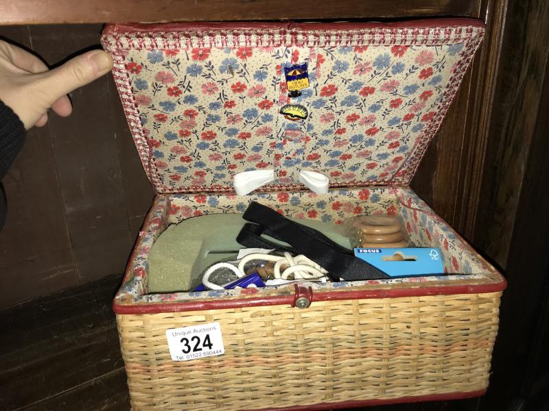 A sewing basket and contents