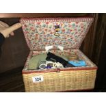 A sewing basket and contents