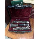 A cased clarinet and an old album