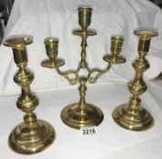 A pair of Victorian brass candlesticks & a 3 branch candle stand